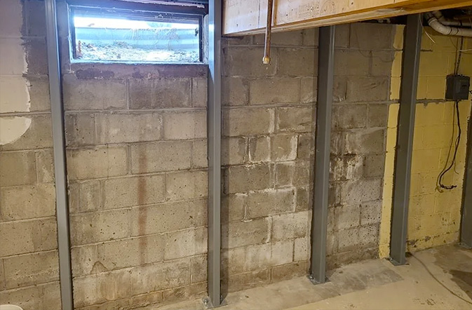 Réparation, stabilisation et redressement de murs en blocs de béton